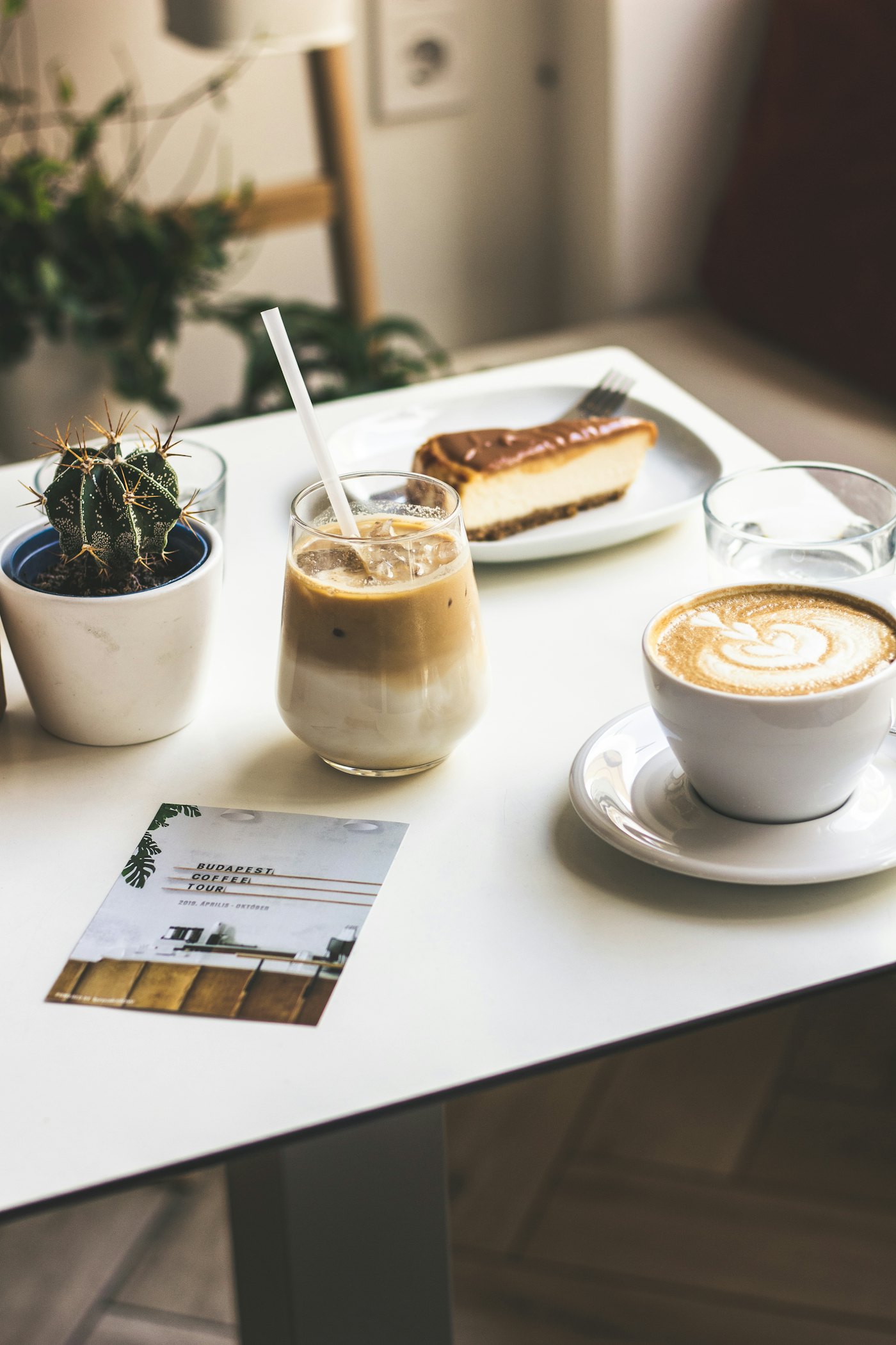 Coffee and cake on a cafe table